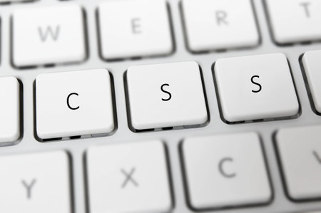 CSS Cascading Style Sheets on white keyboardの写真素材