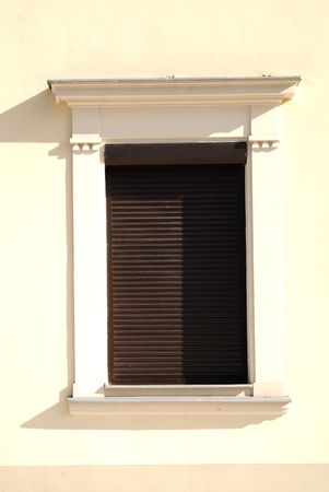 window of the ancient prison brick wall