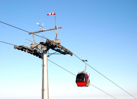 Winter landscape with a red cable carの写真素材