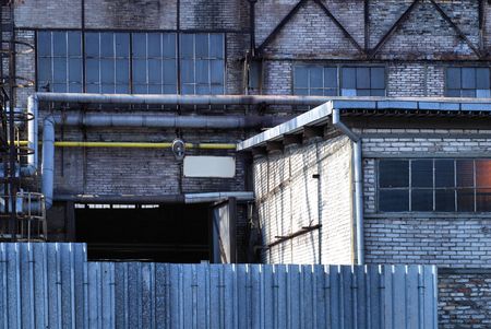 old broken windows in an abandoned buildingの写真素材