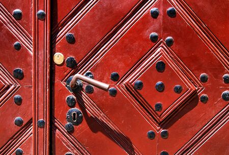 old wooden door with aged paint texture の写真素材
