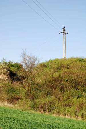 power lines on the blue skyの写真素材