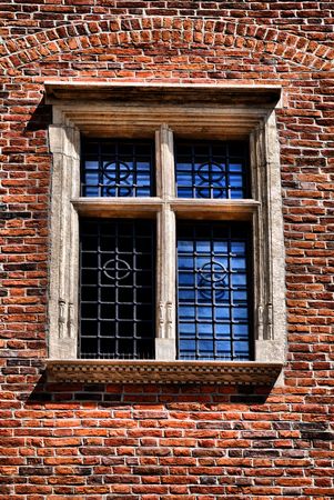  Window of a medieval building, very old brick wallの写真素材