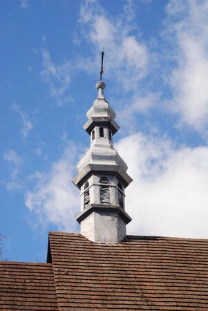 old church with sun and blue skyの写真素材
