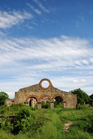 the ruins of the old factory in the skyの写真素材