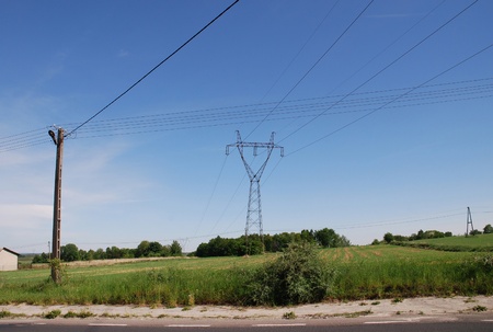 power lines on the blue skyの写真素材