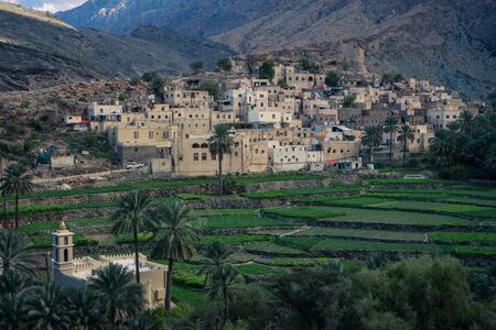 View of the small village Bald Sayt between mountains in Jebel Shams, Omanの写真素材