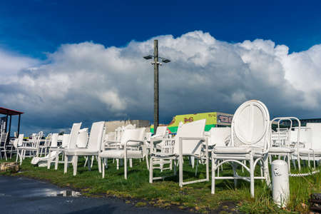 Christchurch, New Zealand, October 2, 2019: Close-up of the 185 White Chairs outdoor sculpture dedicated to the earthquake in the city taken on a sunny dayのeditorial素材