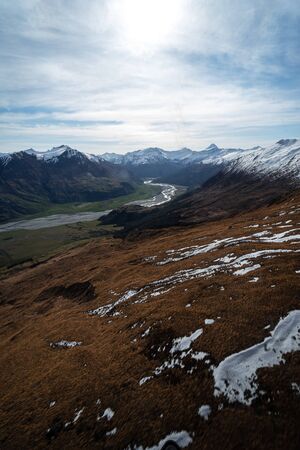 Stunning image of the mouth of the glacier at Lake Wanaka surrounded by snow capped mountains taken...