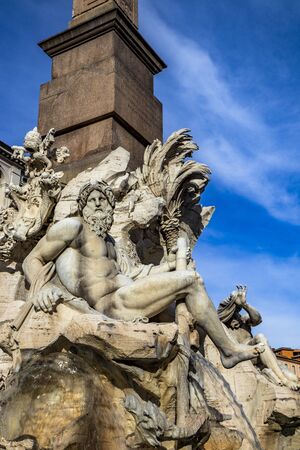 Sculpture of Il Gange, in the Fontana Dei Quattro Fiumi designed in 1651 by Gian Lorenzo Bernini for Pope Innocent X, in Piazza Navona, in Rome, Italy. Fountain of the Four Rivers and river-god Gangesの写真素材
