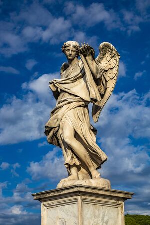 Angelo with the shroud, with the Holy Face, on the Ponte Sant'Angelo above the Tiber, at the Mausoleum of Roman Emperor Hadrian, usually known as Castel Sant'Angelo, in Rome, near the Vatican. Italyの写真素材