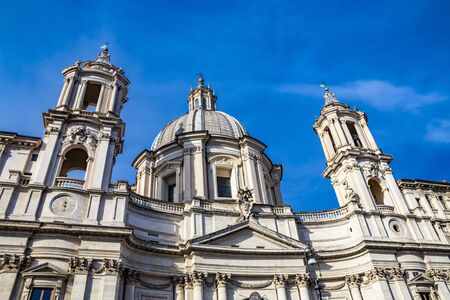 The facade of the church of Sant'Agnese in Agone, in Piazza Navona, ancient Stadium of Domitian, in Rome, Italy.の写真素材