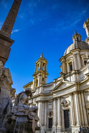 Closeup of the Rio de la Plata, in La Fontana Dei Quattro Fiumi designed by Gian Lorenzo Bernini, in Piazza Navona, Stadium of Domitian, in Rome, Italy. Church of Sant'Agnese in Agone in backgroundの写真素材