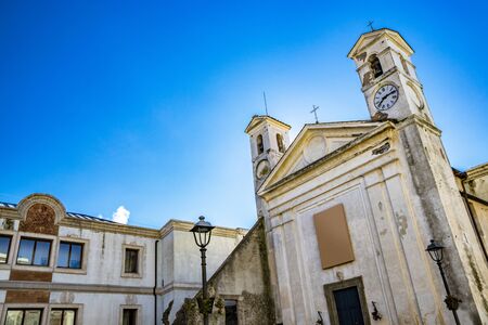 the Municipal Theater Gian Lorenzo Bernini, housed in a deconsecrated church. Bell tower with clock. Ariccia, Castelli Romani, Lazio, Italy.の写真素材