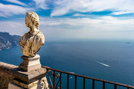October 14, 2018 - Ravello, Campania, Italy - The spectacular panorama that can be admired from the Terrace of the Infinity, in Villa Cimbrone, on the Amalfi coast. The blue sky and some marble busts.のeditorial素材
