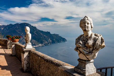 October 14, 2018 - Ravello, Campania, Italy - The spectacular panorama that can be admired from the Terrace of the Infinity, in Villa Cimbrone, on the Amalfi coast. The blue sky and some marble busts.のeditorial素材