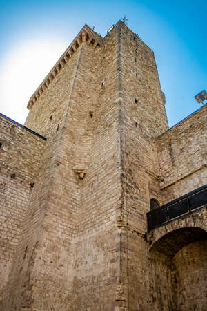 June 30, 2019 - Narni, Umbria, Italy - The courtyard of the medieval castle, in the ancient village of Narni. Blue sky in the summer. The large main tower.のeditorial素材