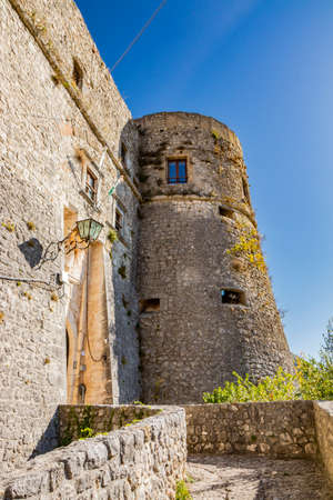 October 27, 2019 - Cerro al Volturno, Isernia, Molise, Italy - An alley of stairs leads to the entrance of the medieval Pandone castle. The large stone walls and guard towers.のeditorial素材