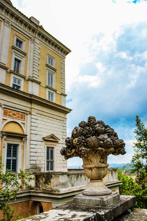 June 3, 2016 - Caprarola, Viterbo, Lazio, Italy - Villa Farnese, a Renaissance and Mannerist construction. The back of the building. In the foreground a sculpture representing a vase of flowers.のeditorial素材