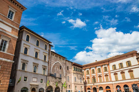 June 1, 2019 - Foligno, Perugia, Umbria, Italy - June 1, 2019 - Foligno, Perugia, Umbria, Italy - The main square of the city, with the town hall headquarters. Blue sky with white clouds in the summer.のeditorial素材
