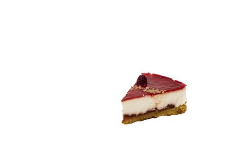 a slice of cheesecake isolated on white background.の写真素材