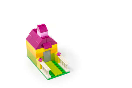 May 15, 2019 - Rome, Italy - Lego house made of classic colored building blocks, isolated on white. Concept of home, construction, investment, savings, development, family, real estate.のeditorial素材