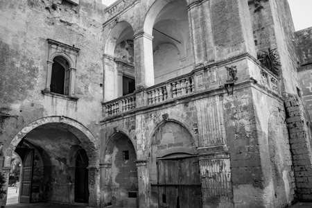 The courtyard of the castle of the Castromediano Lymburgh family, in Cavallino, Lecce, Puglia, Salento, Italy. The ducal palace. Architectural elements in Baroque style.のeditorial素材