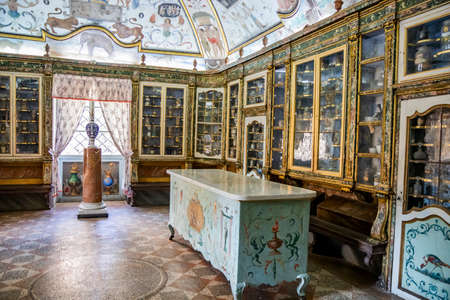 March 24, 2019 - Collepardo, Frosinone, Lazio, Italy - Trisulti Charterhouse. The ancient pharmacy with frescoes and decorations in Pompeian style on the cross vault. The counter, vases and windows.のeditorial素材