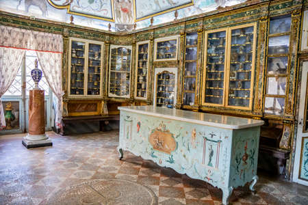 March 24, 2019 - Collepardo, Frosinone, Lazio, Italy - Trisulti Charterhouse. The ancient pharmacy with frescoes and decorations in Pompeian style on the cross vault. The counter, vases and windows.のeditorial素材