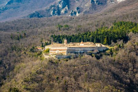 Trisulti Charterhouse is a former Carthusian e Cistercian monastery, in Collepardo, province of Frosinone, Lazio, central Italy. View of the isolated abbey in the Ernici Mountains, in winter.のeditorial素材