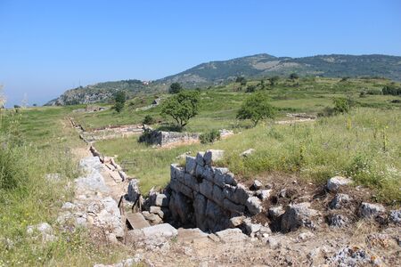 Archaeological site of the ancient city of Norba Latina, in the province of Latina, Lazio, Italy. The remains of stone walls and cobblestone streets.の写真素材
