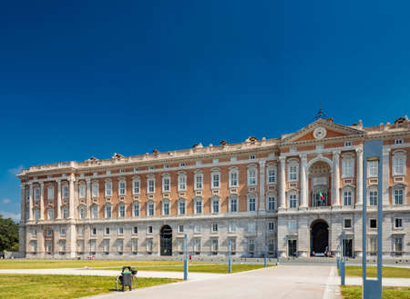 July 3, 2020 - Royal Palace of (Reggia di) Caserta - The large fountain of Aeolus with arches and marble statues. The water flows from above into a small waterfall. Fish in the big basin. Blue sky.のeditorial素材