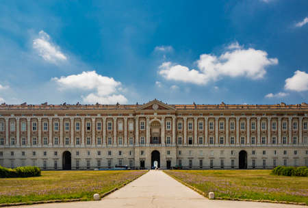 July 3, 2020 - Royal Palace of (Reggia di) Caserta - The large fountain of Aeolus with arches and marble statues. The water flows from above into a small waterfall. Fish in the big basin. Blue sky.のeditorial素材