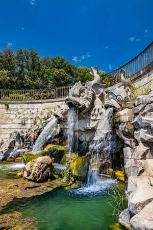 July 3, 2020 - Royal Palace of (Reggia di) Caserta - The huge and very long basin of the park's artificial lake. The perspective view, towards the waterfall and the numerous pools and water features.のeditorial素材