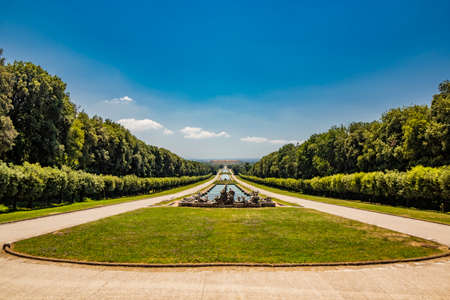 July 3, 2020 - Royal Palace of (Reggia di) Caserta - The huge and very long basin of the park's artificial lake. The perspective view, towards the waterfall and the numerous pools and water features.のeditorial素材