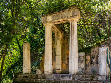 July 3, 2020 - Royal Palace of (Reggia di) Caserta - The very long basin of the park's artificial lake. The perspective view. The marble statues look and extend their hand towards the palace. Blue skyのeditorial素材