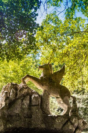 June 28, 2020 - Sacro Bosco (Sacred Grove) or Park of the Monsters of Bomarzo - Mannerist monumental garden. The bear with the Roman rose, coat of arms of the Orsini.のeditorial素材