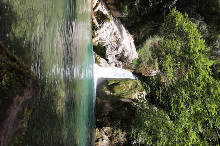 The waterfall of San Benedetto in Subiaco, Rome, Lazio, Italy. Rich vegetation in the woods. Cool place, refreshment from summer heat. Trekking, mountain excursion. Peace, silence, nature.の写真素材