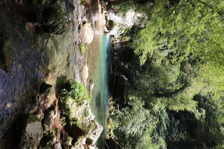 The waterfall of San Benedetto in Subiaco, Rome, Lazio, Italy. Rich vegetation in the woods. Cool place, refreshment from summer heat. Trekking, mountain excursion. Peace, silence, nature.の写真素材
