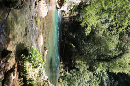 The waterfall of San Benedetto in Subiaco, Rome, Lazio, Italy. Rich vegetation in the woods. Cool place, refreshment from summer heat. Trekking, mountain excursion. Peace, silence, nature.の写真素材