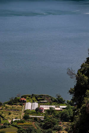 The lake of Nemi, in the province of Rome, in the Roman castles, Italy. Top view of the lake.の写真素材