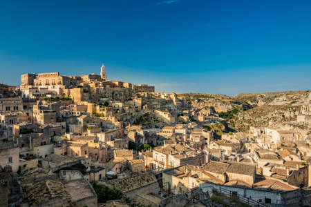 Matera, Basilicata, Italy - Panoramic view from the top of the Sassi of Matera, Barisano and Caveoso. The ancient houses of stone and brick, carved into the rock.の写真素材