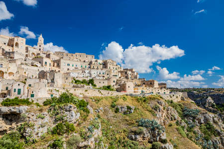 Matera, Basilicata, Italy - The Murgia Materana Park with the typical caves and rock churches carved into the rock. The homes of the ancient inhabitants of the city.の写真素材