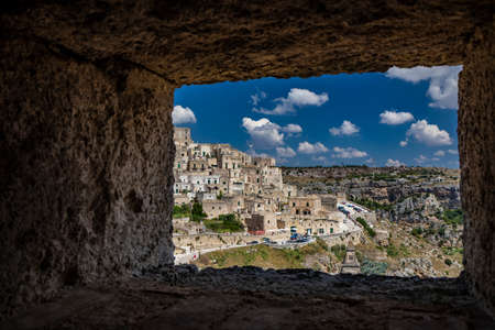 Matera, Basilicata, Italy - The Murgia Materana Park with the typical caves and rock churches carved into the rock. The homes of the ancient inhabitants of the city.の写真素材