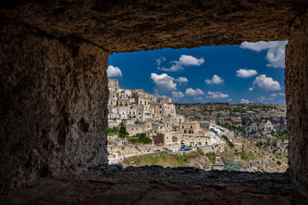 Matera, Basilicata, Italy - The Murgia Materana Park with the typical caves and rock churches carved into the rock. The homes of the ancient inhabitants of the city.の素材 [FY310156086750]