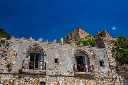 Craco, Matera, Basilicata, Italy. The ghost town destroyed and abandoned following a landslide. The ancient church of the city, with its bell tower, almost completely destroyed.のeditorial素材