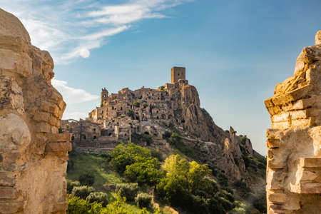 Craco, Matera, Basilicata, Italy. The ghost town destroyed and abandoned following a landslide. The ancient church of the city, with its bell tower, almost completely destroyed.のeditorial素材