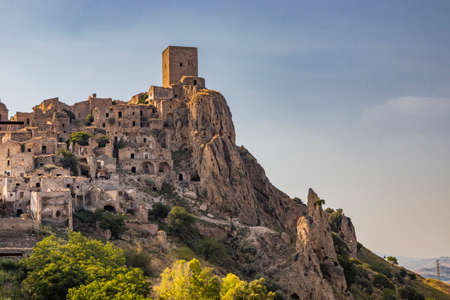 Craco, Matera, Basilicata, Italy. The ghost town destroyed and abandoned following a landslide. The ancient church of the city, with its bell tower, almost completely destroyed.のeditorial素材