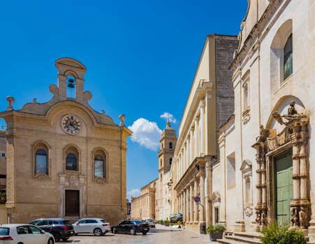 August 12, 2020 - Gravina in Puglia, Italy - The main square of the ancient city, overlooked by a church and the cathedral with the bell tower.のeditorial素材