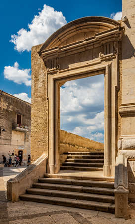August 12, 2020 - Gravina in Puglia, Italy - The main square of the ancient city, overlooked by a church and the cathedral with the bell tower.のeditorial素材